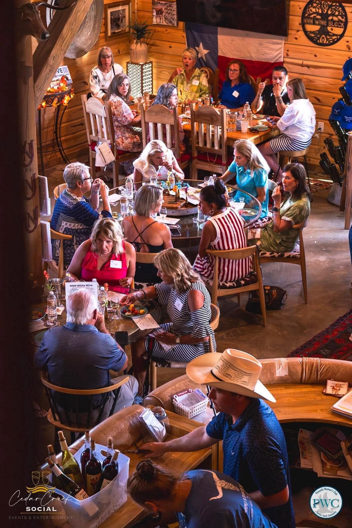 Group enjoying a wine tasting at a Texas winery